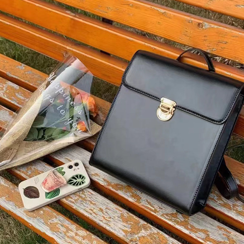 Retro Casual Black Leather Backpack for Women - Minimalist Travel Commuter Bag with Artistic Design